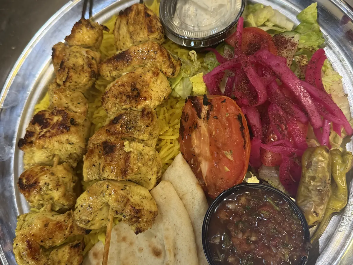 Chicken Skewer (Souvlaki) at Kaboblicious: two chicken skewers over rice with warm pita, pickled onion, mixed salad, grilled tomato and banana peppers
